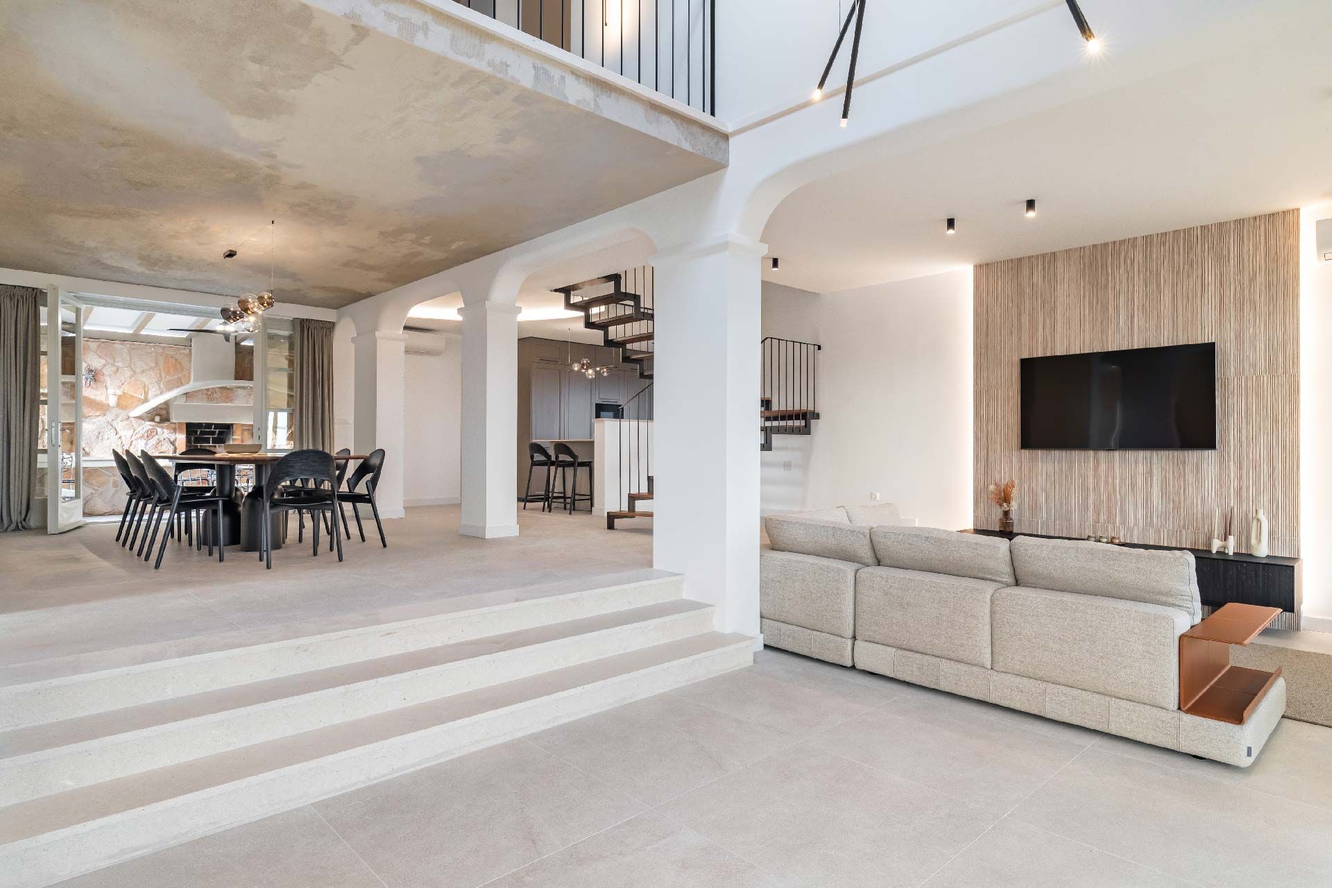 Open-plan living and dining area at Villa del Mar